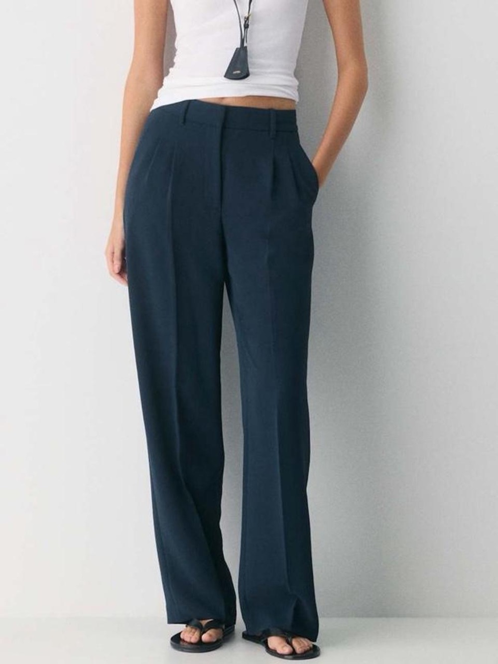 Aritzia The Effortless Pant™ - Crepette™ High-waisted, wide-leg trouser in navy. - Picture 1 of 8